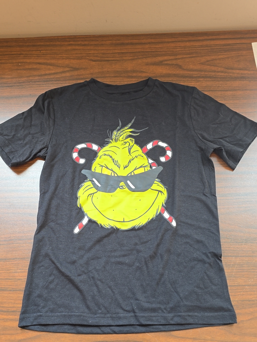 Hybrid Apparel Black Tee with Yellow and Red Grinch Graphic